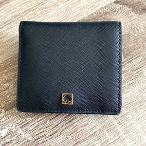 Black Kate Spade wallet.